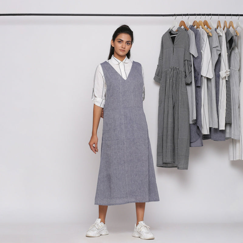 Front View of a Model wearing Deep V-Neck Charcoal Grey Pinafore Dress