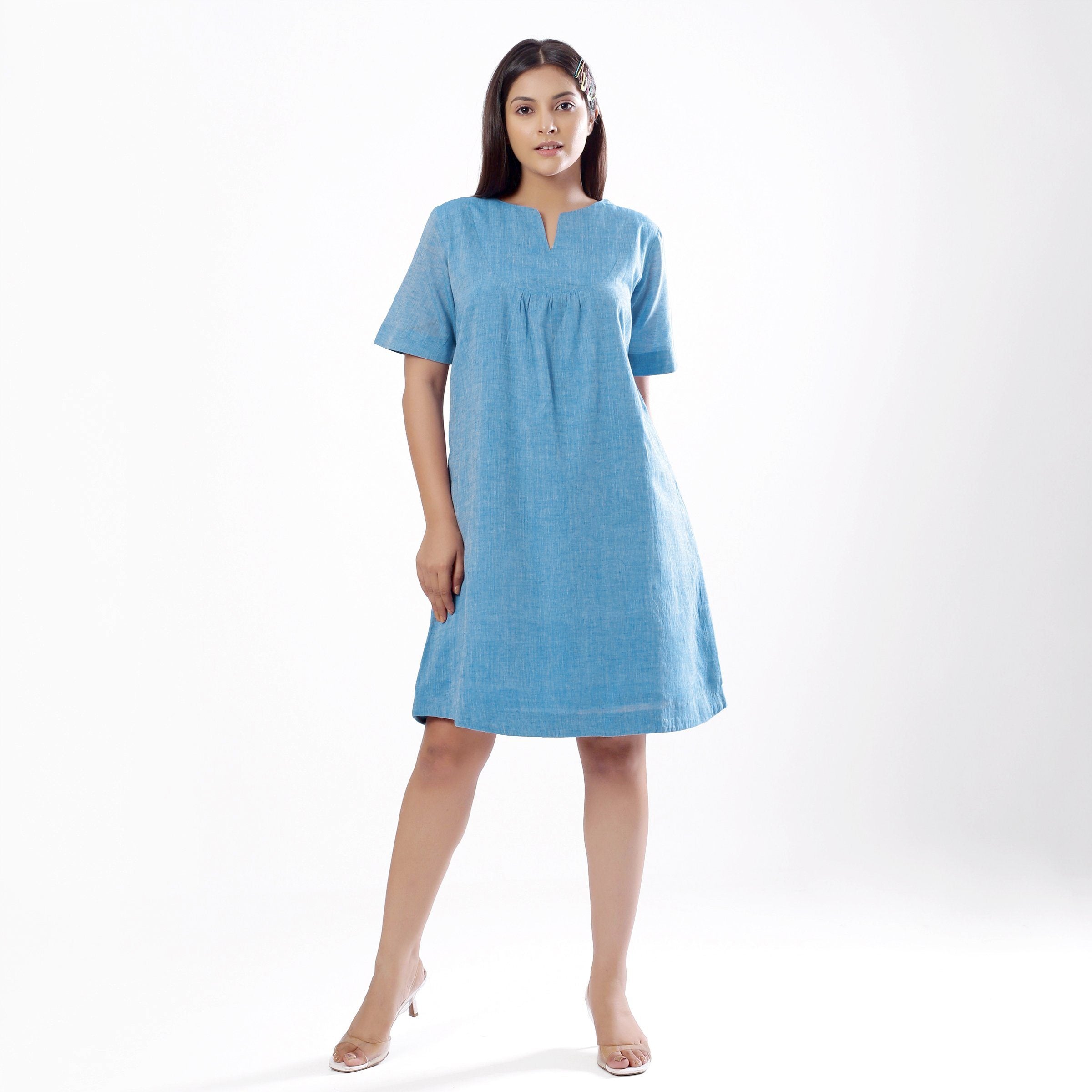 Front View of a Model wearing Handspun Sky Blue Yoked Shift Dress