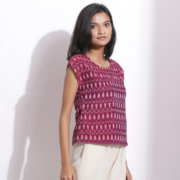 Right View of a Model wearing Handwoven Ikat Berry Wine Straight Top