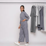 Left View of a Model wearing Handspun Charcoal Grey Straight Jumpsuit