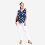 Front View of a Model wearing Indigo Dabu Block Printed Sleeveless V-Neck Top