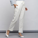 Right View of a Model wearing Off-White Crinkled Cotton Tapered Pant