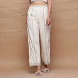 Front View of a Model wearing Jute Laced Cotton Ecru Straight Pant