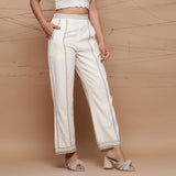 Right View of a Model wearing Jute Laced Cotton Ecru Straight Pant