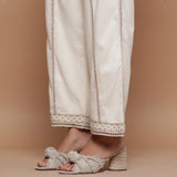 Close View of a Model wearing Jute Laced Cotton Ecru Straight Pant