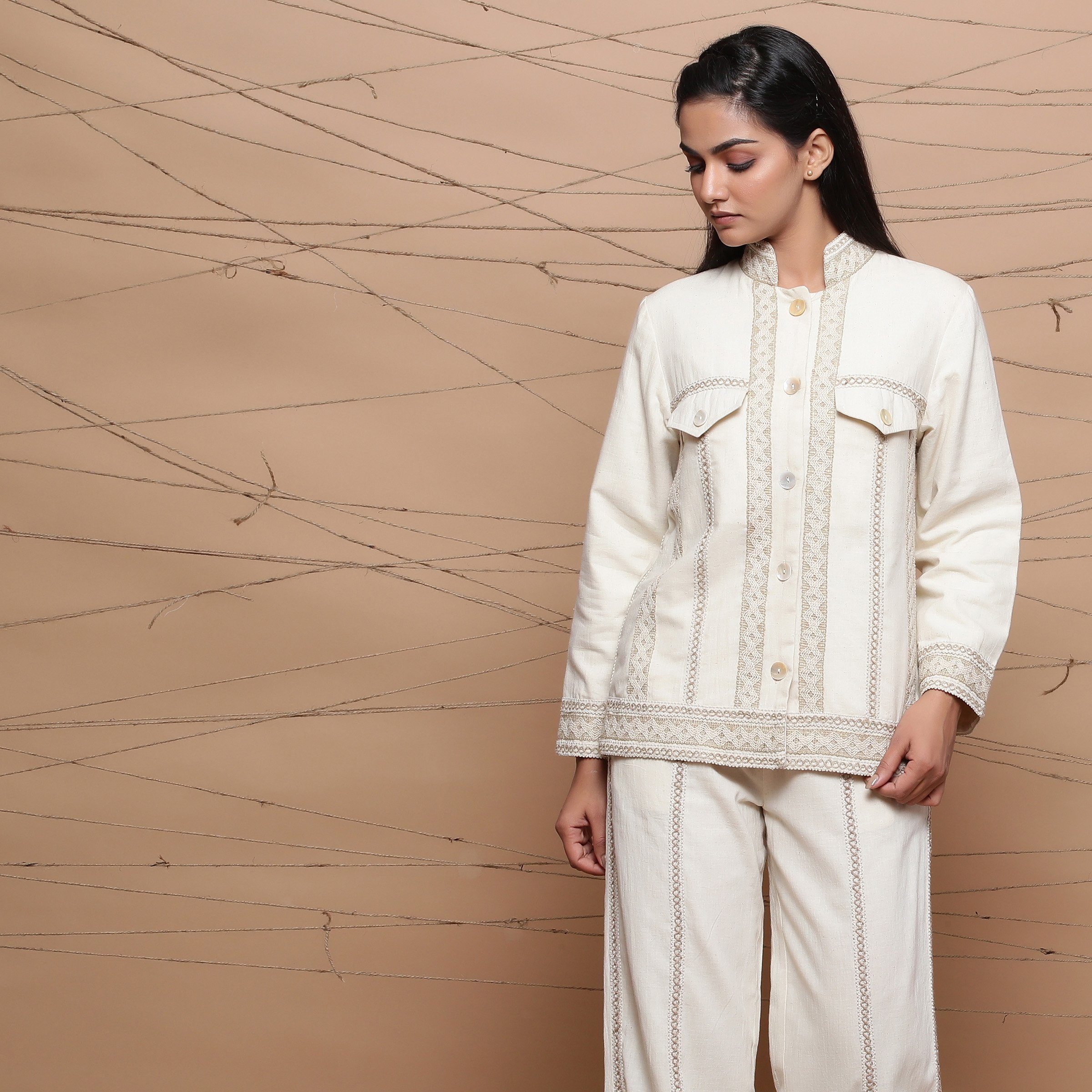 Front View of a Model wearing Undyed Handspun Jute Lace Cargo Jacket
