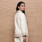 Back View of a Model wearing Undyed Handspun Jute Lace Cargo Jacket