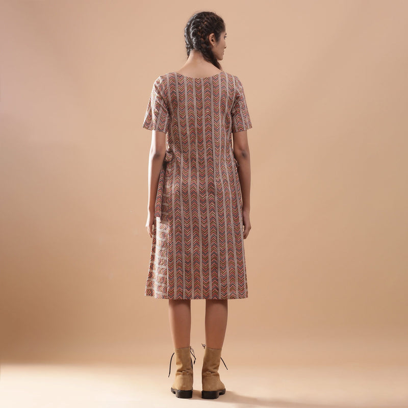 Back View of a Model wearing Kalamkari Chevron Striped Paneled Dress