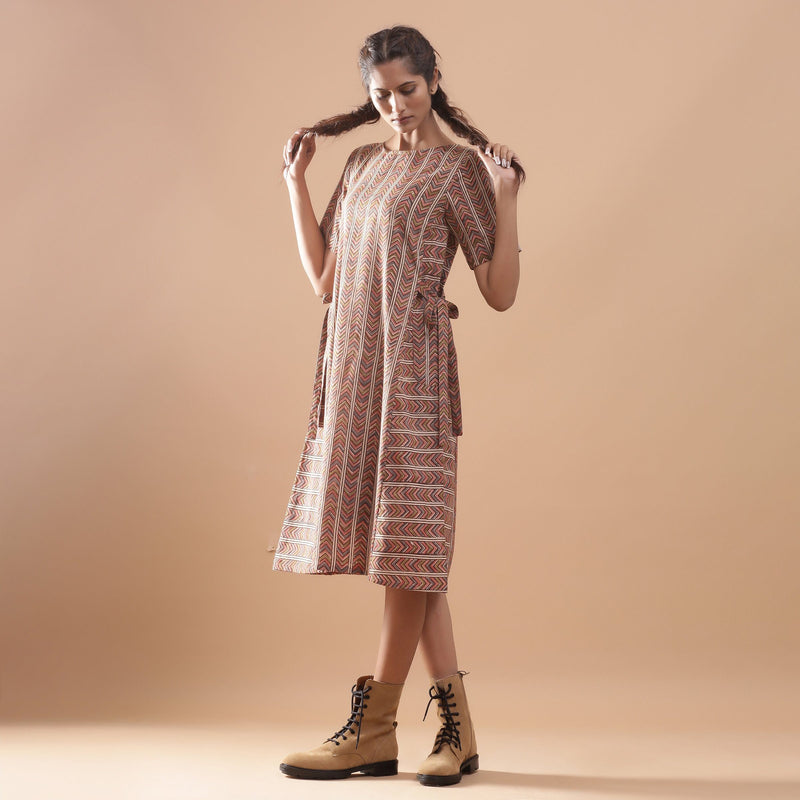 Front View of a Model wearing Kalamkari Chevron Striped Paneled Dress