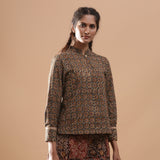 Front View of a Model wearing Muddy Green Kalamkari Warm Shirt