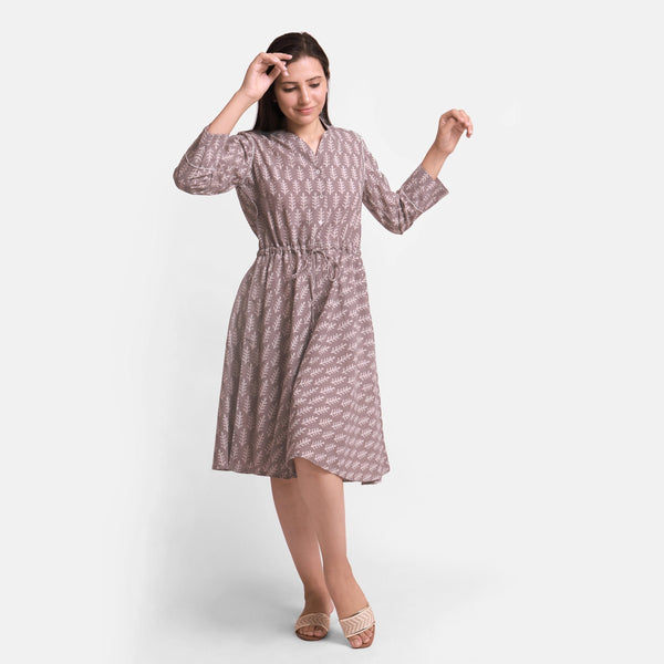 Front View of a Model wearing Kashish Botanical Pattern Button-Down Dress