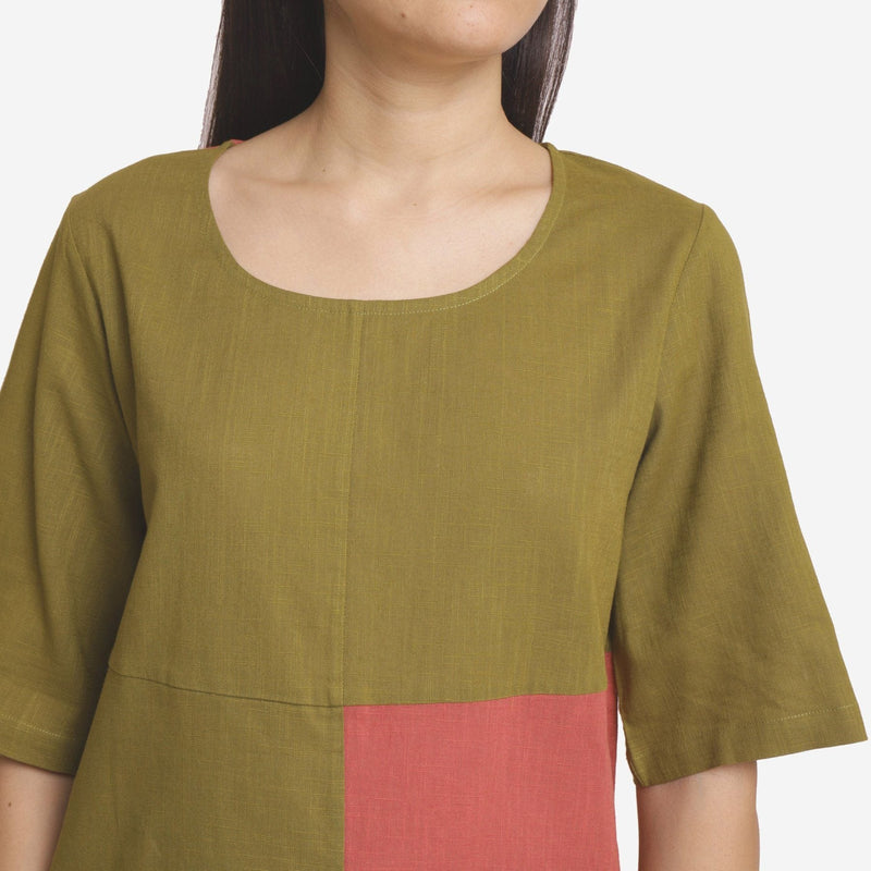Front Detail of a Model wearing Comfy Khakhi Green And Brick Red Top
