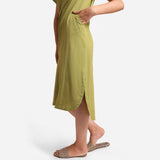 Left View of a Model wearing Khaki Green Cotton Welt Pocket Dress