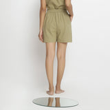 Back View of a Model wearing Khaki Vegetable Dyed Handspun Short Shorts