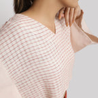 Front Detail of a Model wearing Pink Vegetable Dyed V-Neck Crop Top