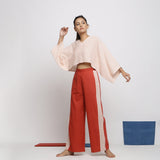Front View of a Model wearing Kimono Sleeves Crop Top and Brick Red Pant Set
