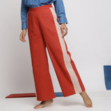 Front View of a Model wearing Brick Red Vegetable Dyed Wide Legged Pant