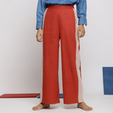 Front View of a Model wearing Brick Red Vegetable Dyed Wide Legged Pant