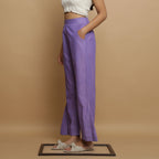 Left View of a Model wearing Lavender Ankle-Length Godet Pant