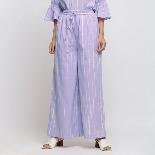 Front View of a Model wearing Lavender Tie Dye Wide Legged Palazzo Pant