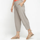 Left View of a Model wearing Yarn Dyed Cotton Beige Paneled Pant