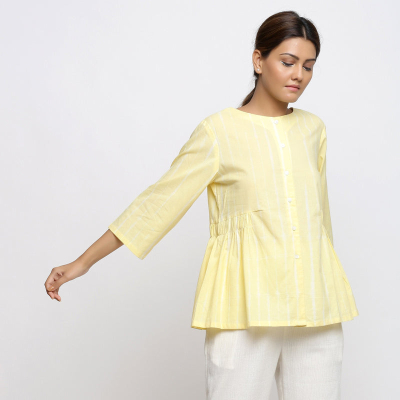 Right View of a Model wearing Light Yellow Cotton Button-Down Top