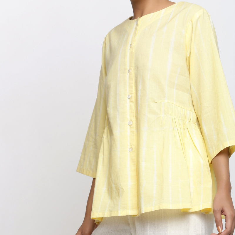 Front Detail of a Model wearing Light Yellow Cotton Button-Down Top