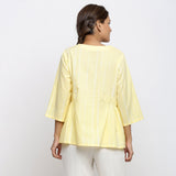 Back View of a Model wearing Light Yellow Cotton Button-Down Top