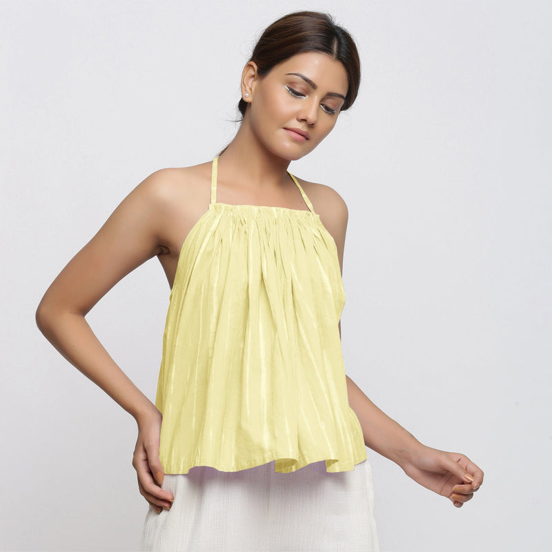 Front View of a Model wearing Light Yellow Tie Dye Strappy Camisole Top