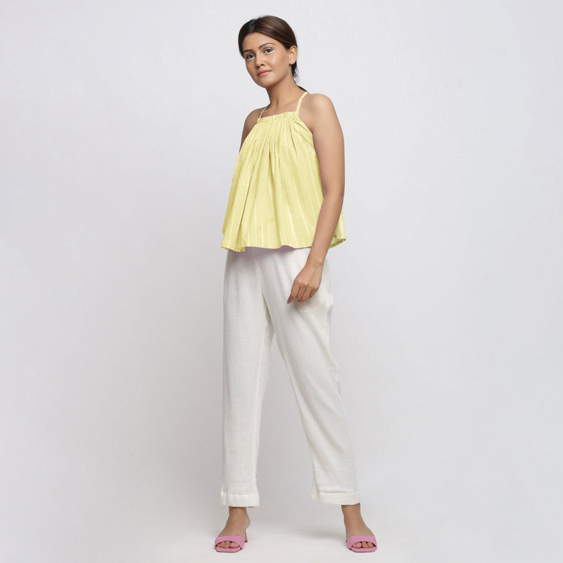 Front View of a Model wearing Light Yellow Top and Crinkled Cotton Pant Set