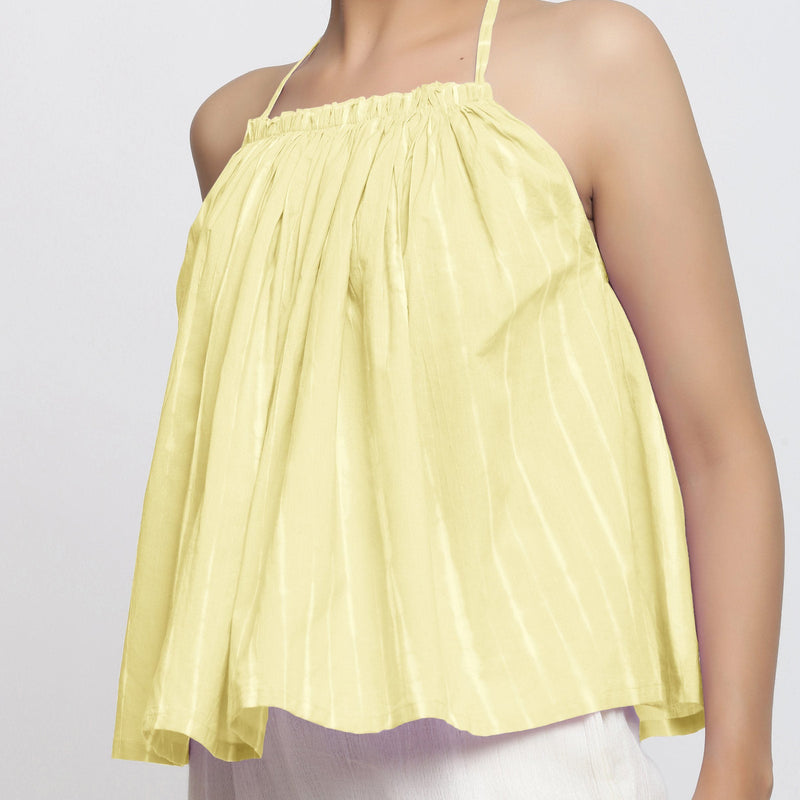 Front Detail of a Model wearing Light Yellow Tie Dye Strappy Camisole Top