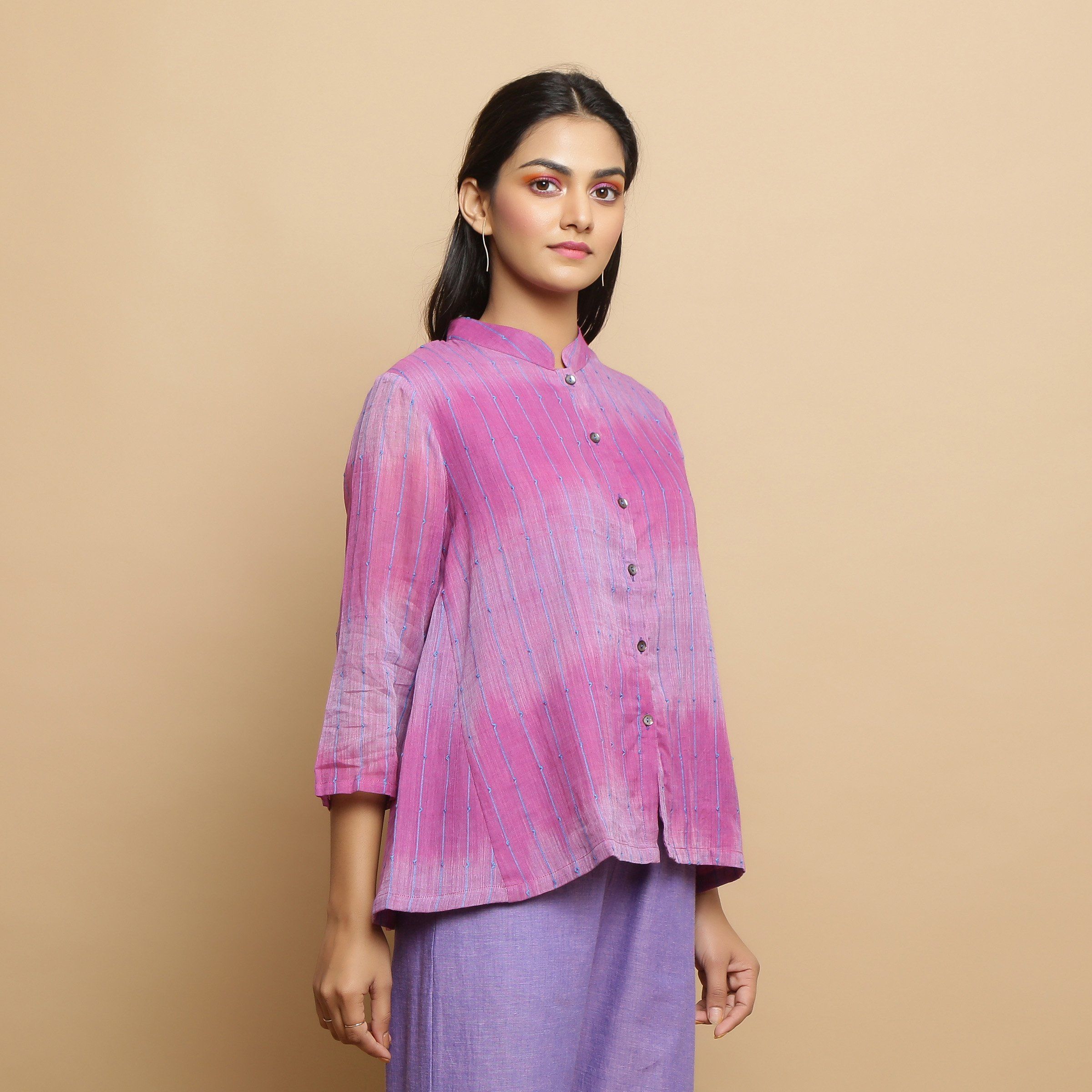Right View of a Model wearing Lilac Handwoven Striped Button-Down Top
