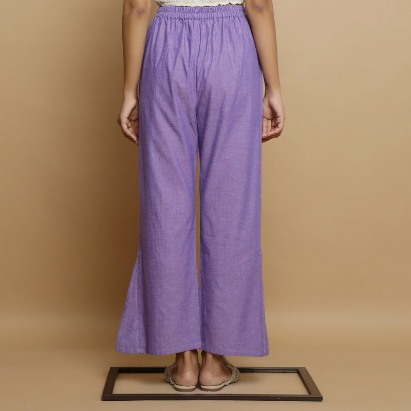 Back View of a Model wearing Lavender Ankle-Length Godet Pant