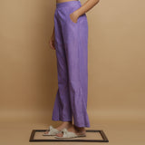 Left View of a Model wearing Lavender Ankle-Length Godet Pant