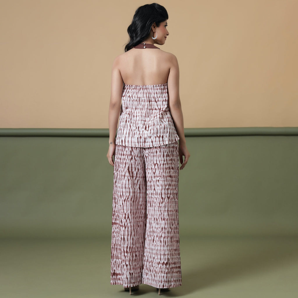 Back View of a Model wearing Maroon Shibori Flared Top and Pant Set