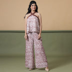 Front View of a Model wearing Maroon Shibori Flared Top and Pant Set