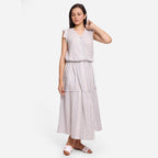 Front View of a Model wearing White Crinkled Cotton Tier Maxi Skirt