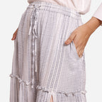 Front Detail of a Model wearing White Crinkled Cotton Tier Maxi Skirt