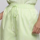 Front Detail of a Model wearing Mint Green Tie Dye Bermuda Shorts