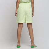 Back View of a Model wearing Mint Green Tie Dye Bermuda Shorts