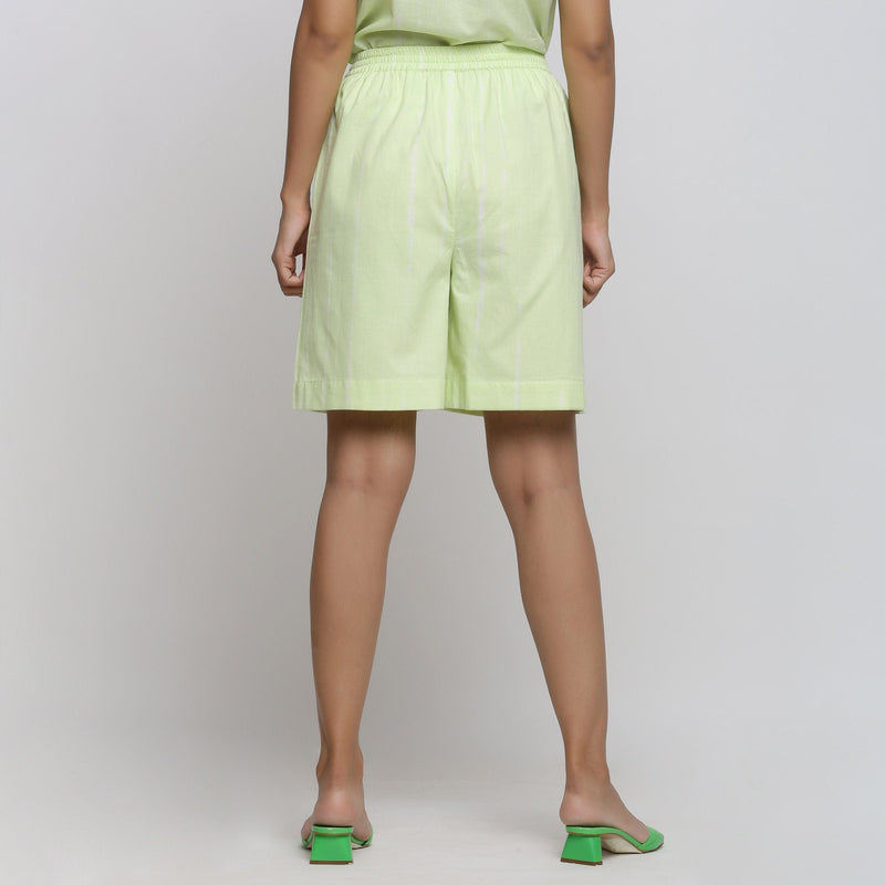 Back View of a Model wearing Mint Green Tie Dye Bermuda Shorts