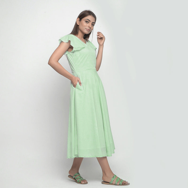 Right View of a Model wearing Mint Green Cotton Fit and Flare Dress