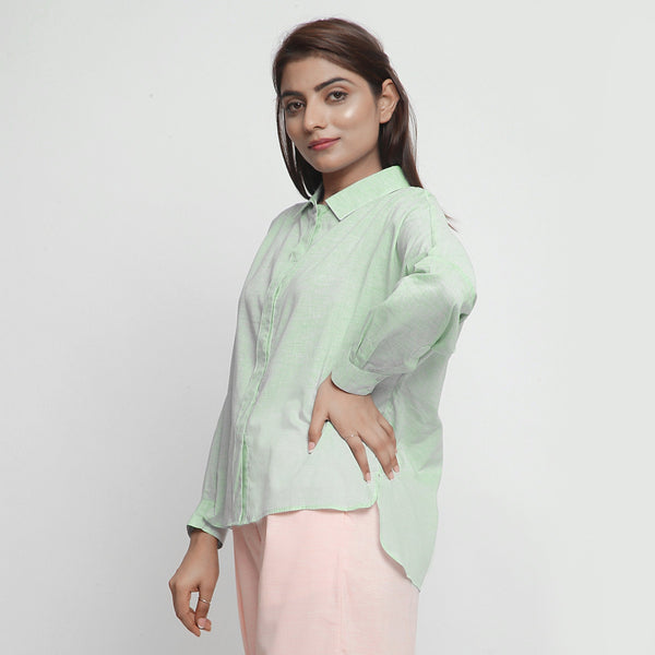 Left View of a Model wearing Mint Green Cotton High Low Long Top