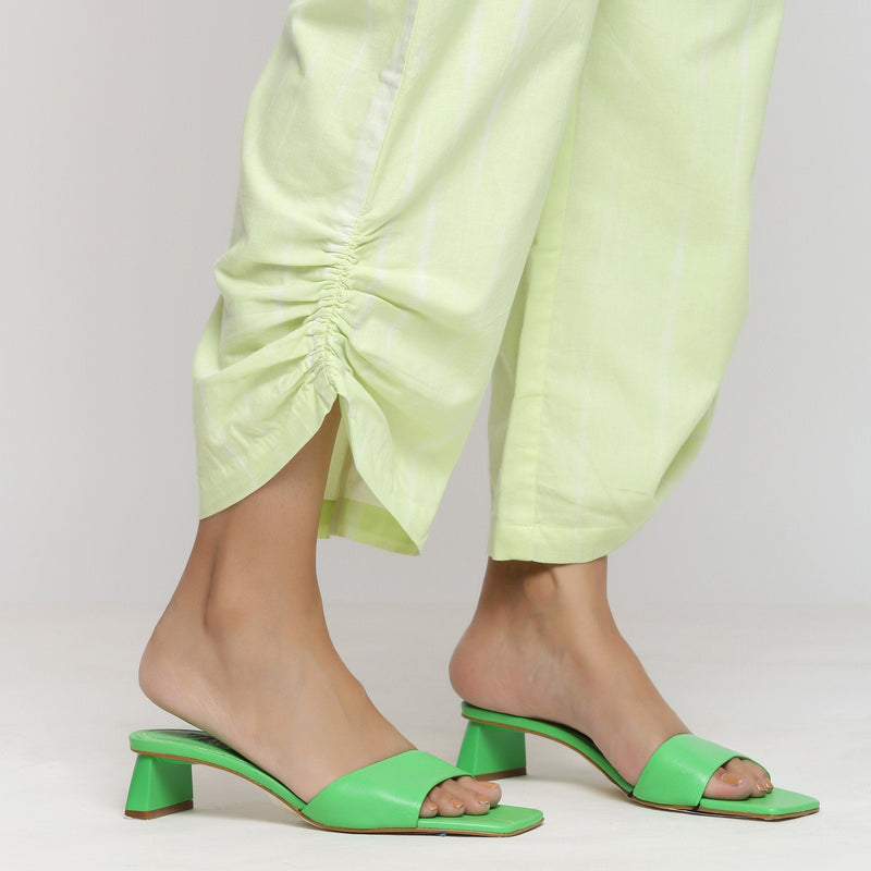 Right Detail of a Model wearing Mint Green Tie And Dye Straight Pant
