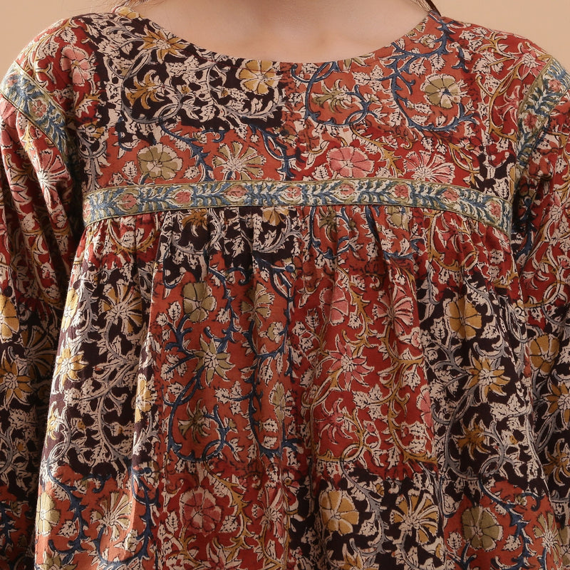 Front Detail of a Model wearing Muddy Red Kalamkari Flannel Floral Top