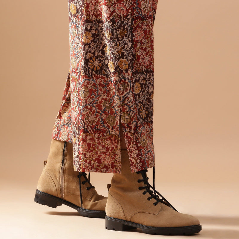 Close View of a Model wearing Muddy Red Wide-Leg Kalamkari Slit Pant