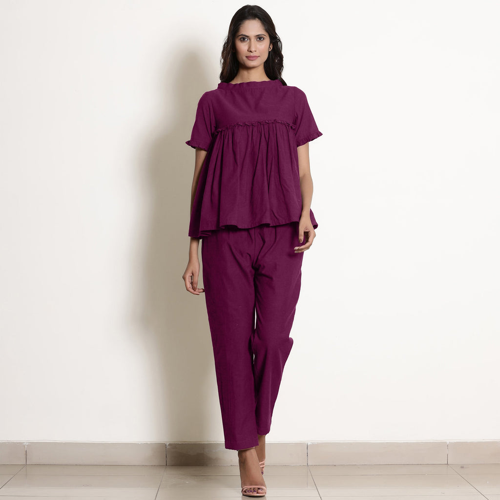 Front View of a Model wearing Mulberry Frilled Top and Tapered Pant Set