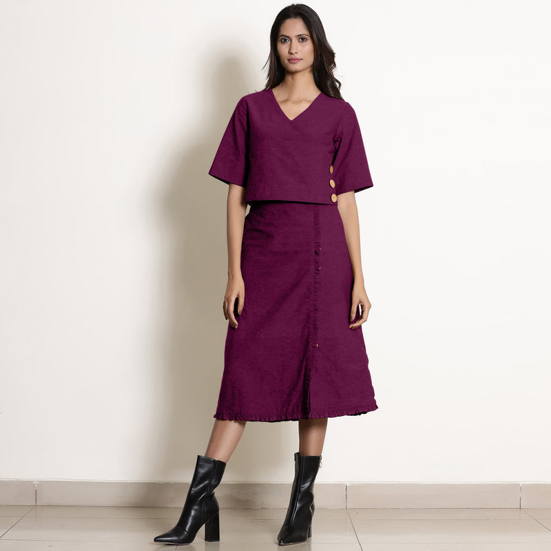 Front View of a Model wearing Mulberry Wrap Top and A-Line Skirt Set