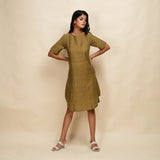 Front View of a Model wearing Mustard Gold 100% Cotton Khadi Knee Length Dress