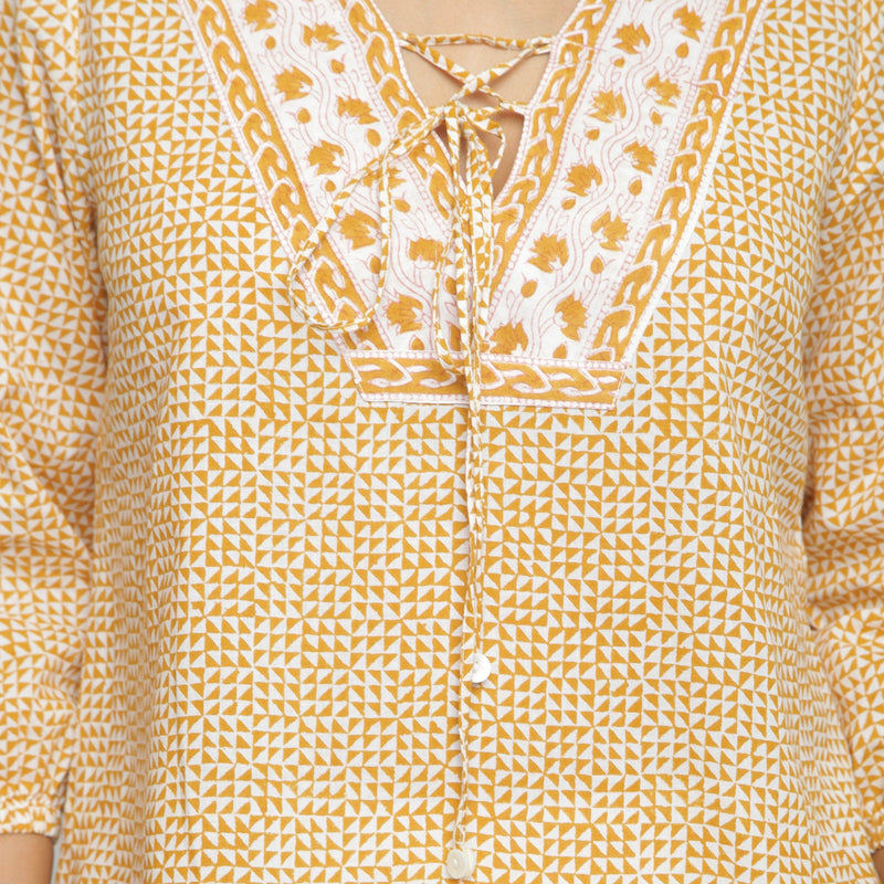 Front Detail of a Model wearing Mustard Hand Block Printed Straight Top